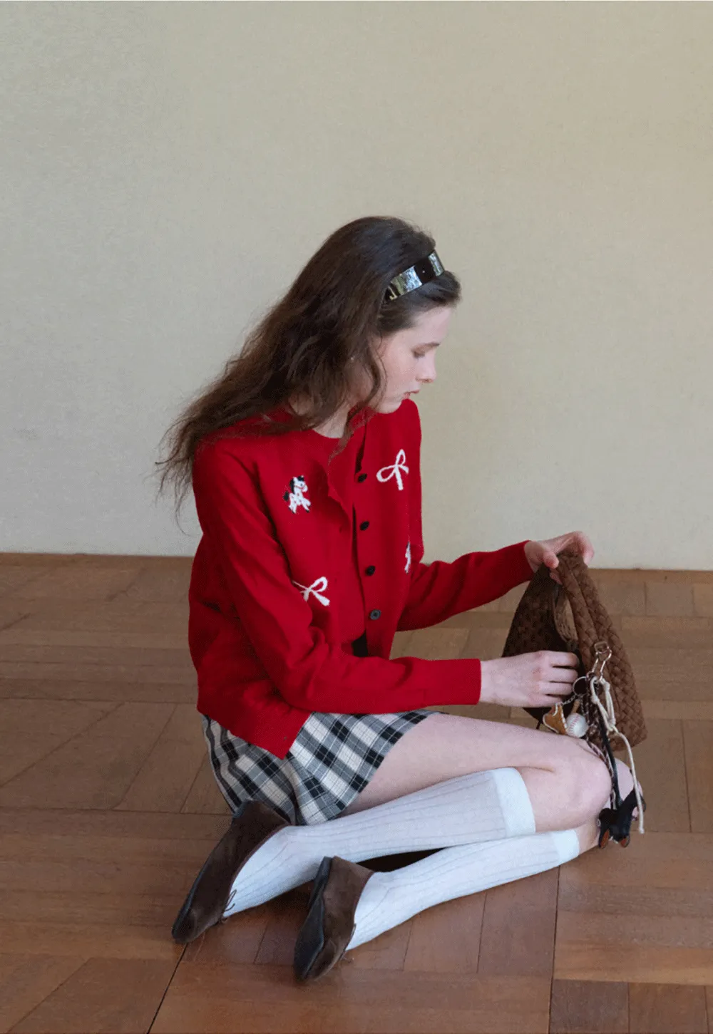 Woolen knit sweater with horse and bow motifs