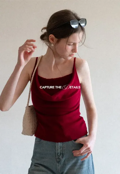 Silk-like tank top with thin straps and draped neckline