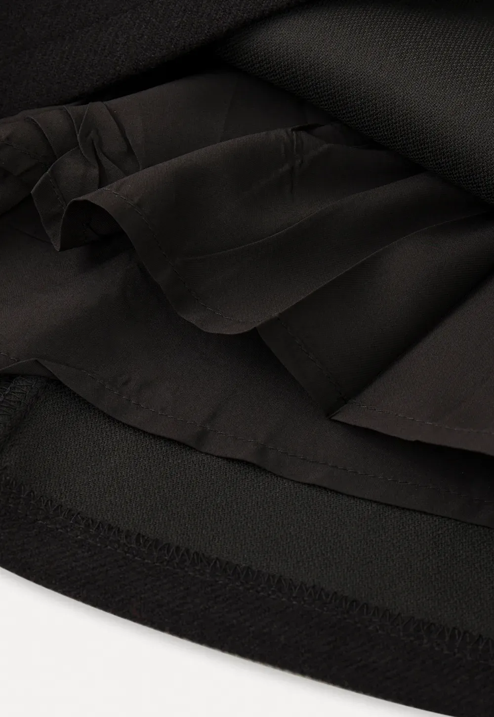 Elegant Mini Skirt with Front Slit and Button Detail