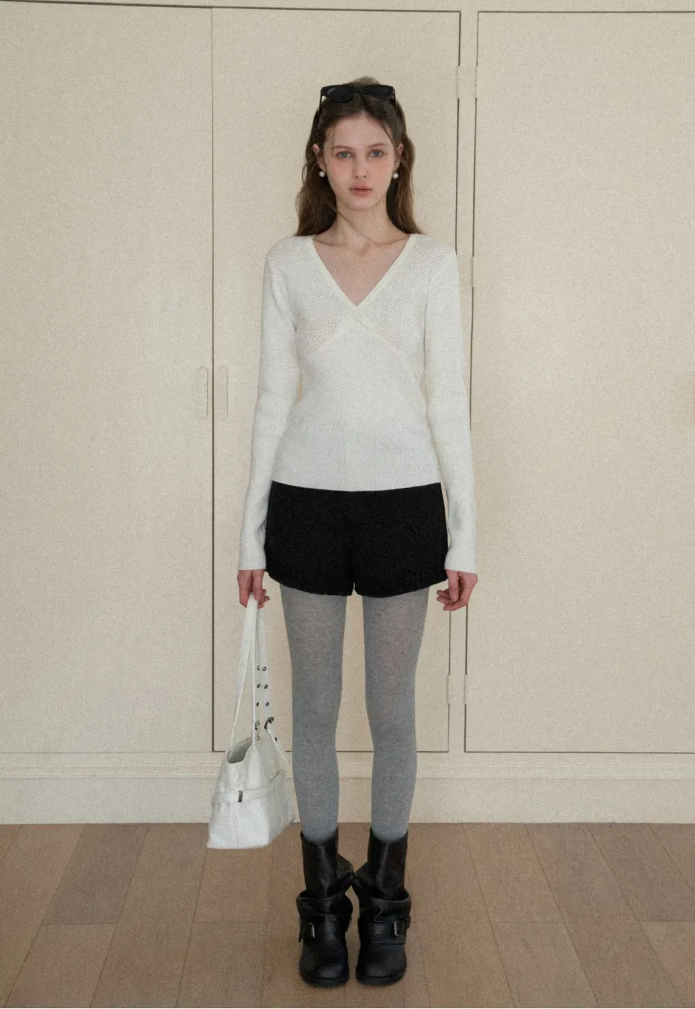 High waist shorts with ruffle hem and belt design