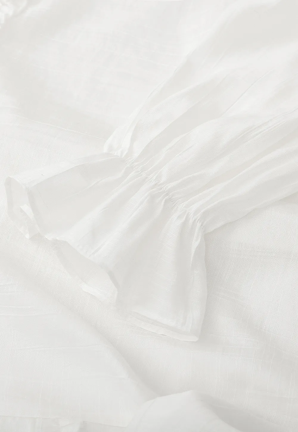 Elegant Blouse with Ruffle Detail and Tie Front Design