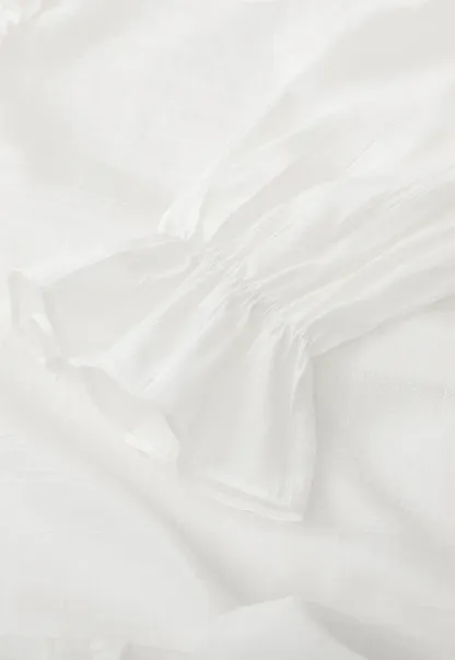 Elegant Blouse with Ruffle Detail and Tie Front Design