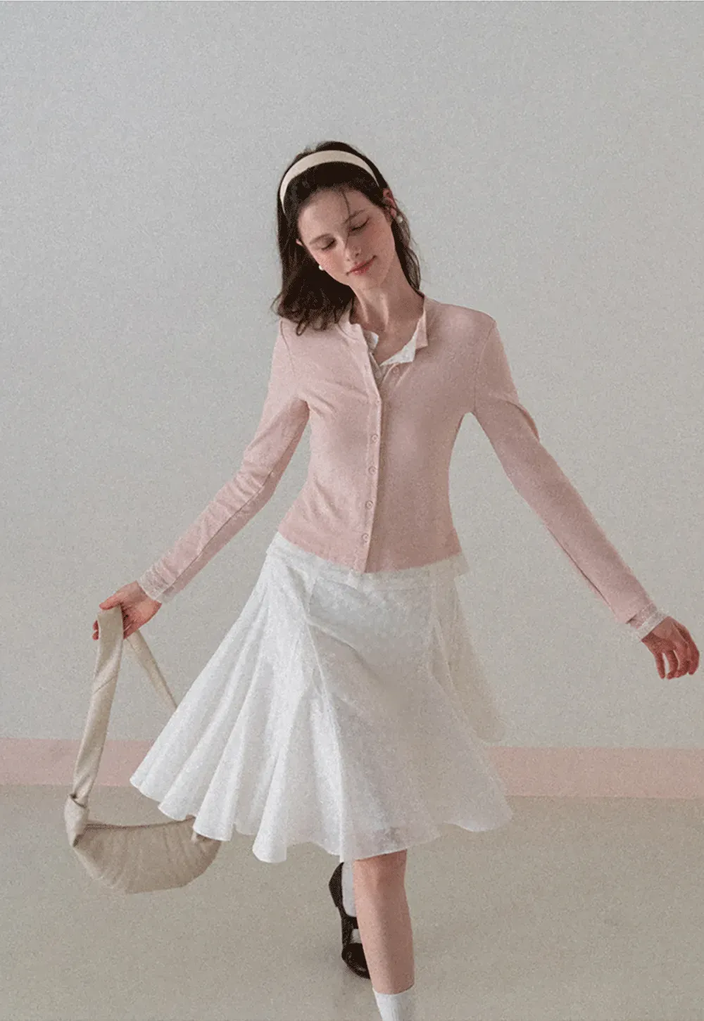 Long sleeve button front knit top with collar