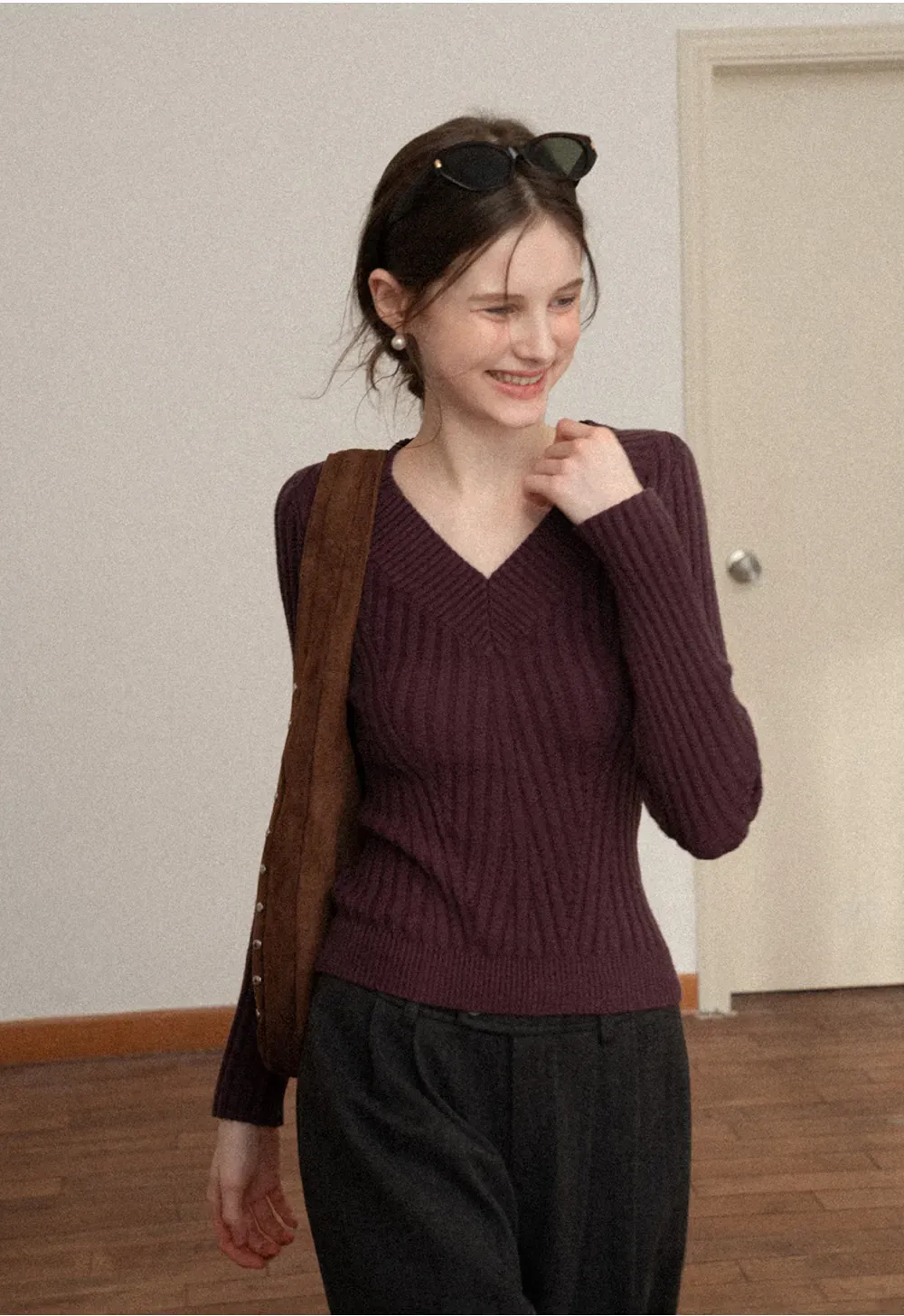 Elegant Ribbed Knit Sweater with V-Neck Design