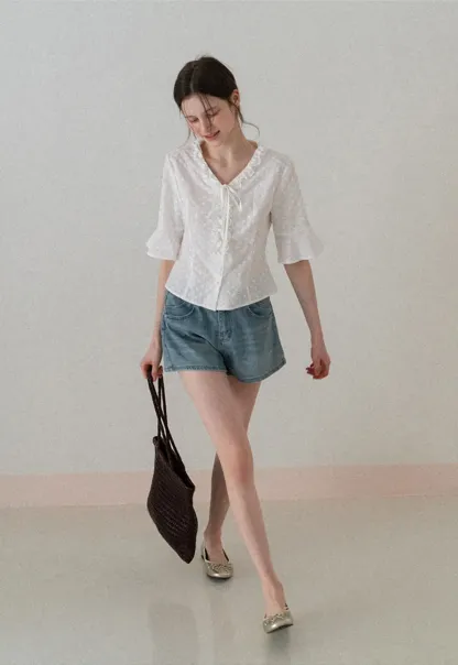 V neck blouse with lace trim and tie front