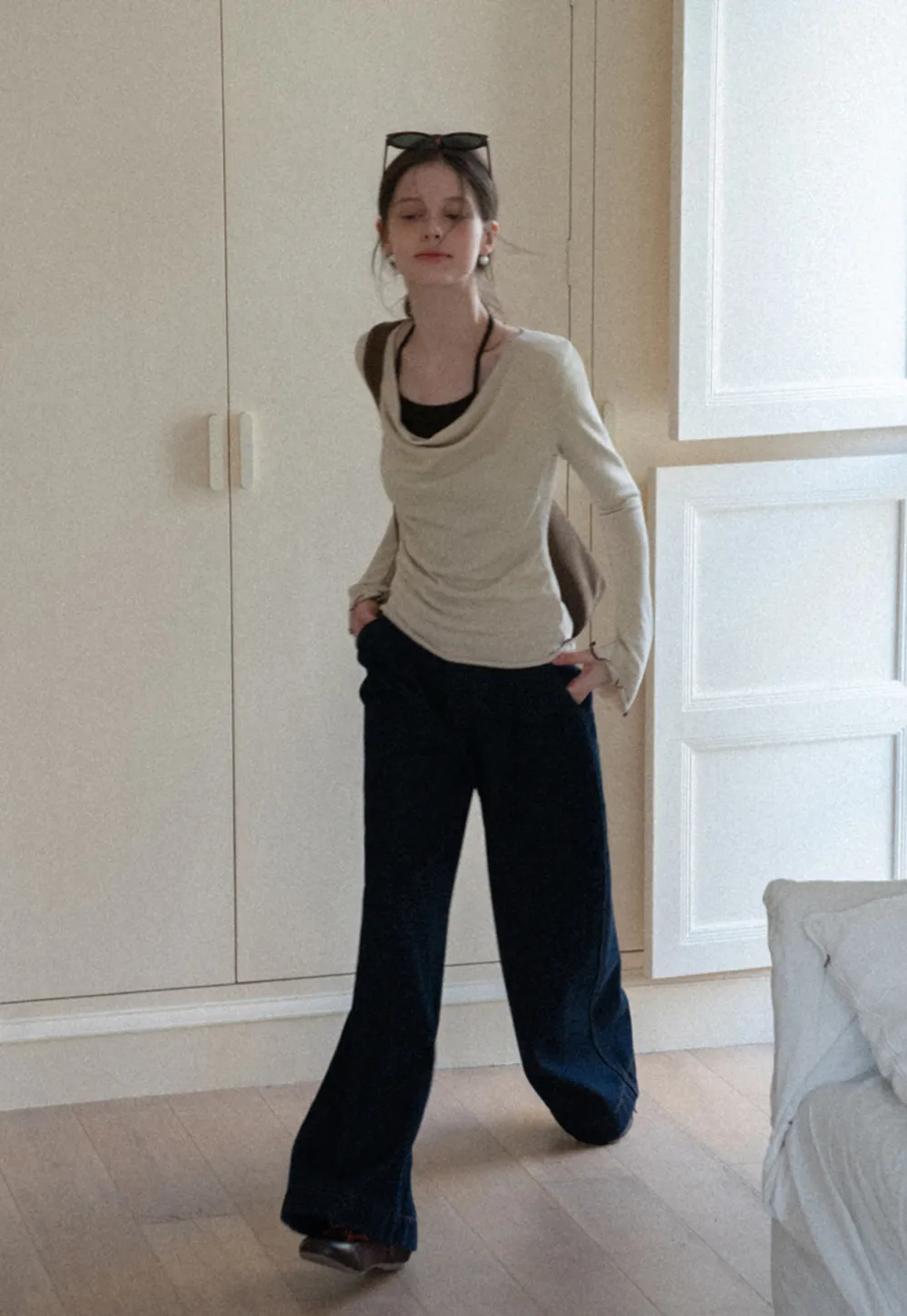 Beige Long-Sleeve Top with Ruffled Hem and Bow Tie Back