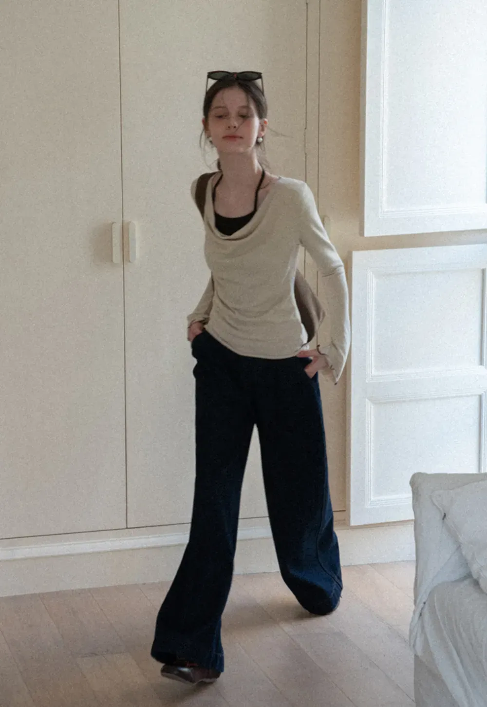 Beige Long-Sleeve Top with Ruffled Hem and Bow Tie Back