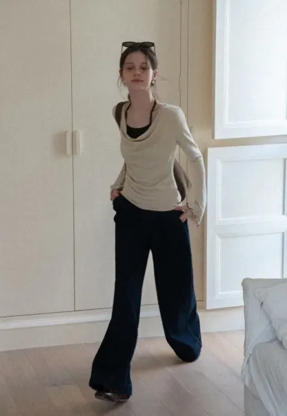 Beige Long-Sleeve Top with Ruffled Hem and Bow Tie Back