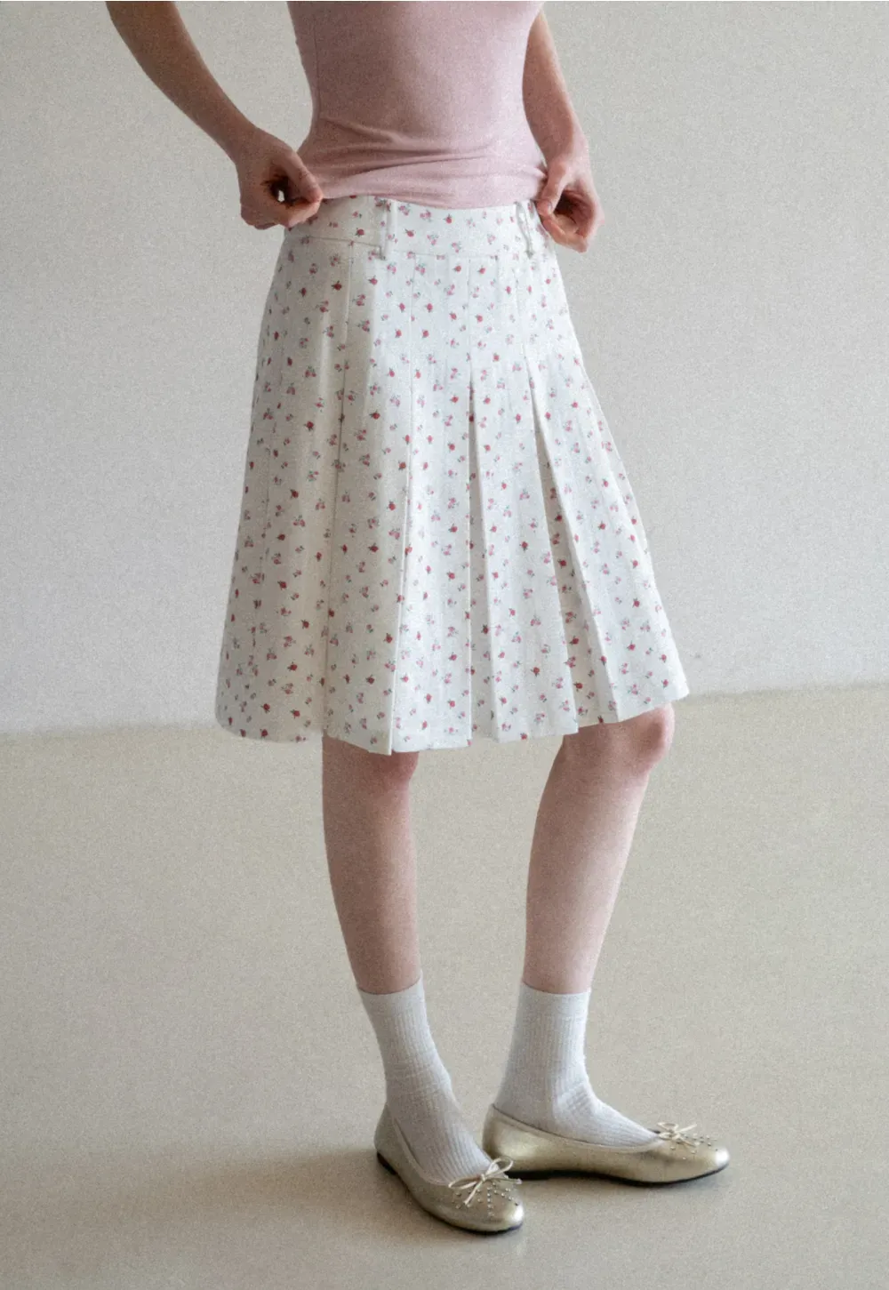 Pleated skirt with floral print