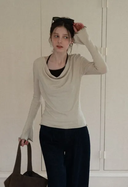 Beige Long-Sleeve Top with Ruffled Hem and Bow Tie Back