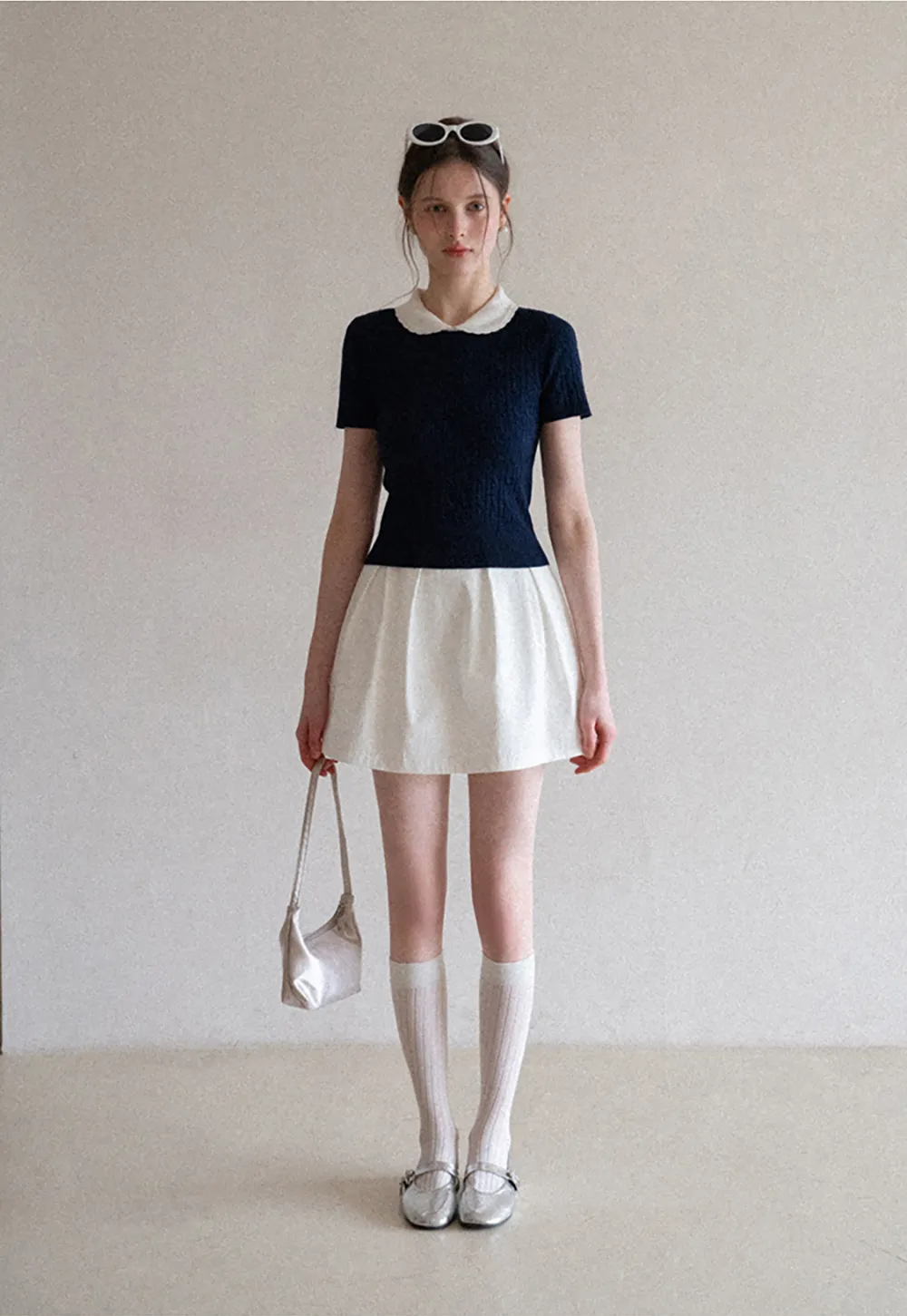 Plaid skirt with pleats and ruffled top