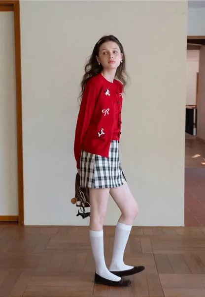 Woolen knit sweater with horse and bow motifs