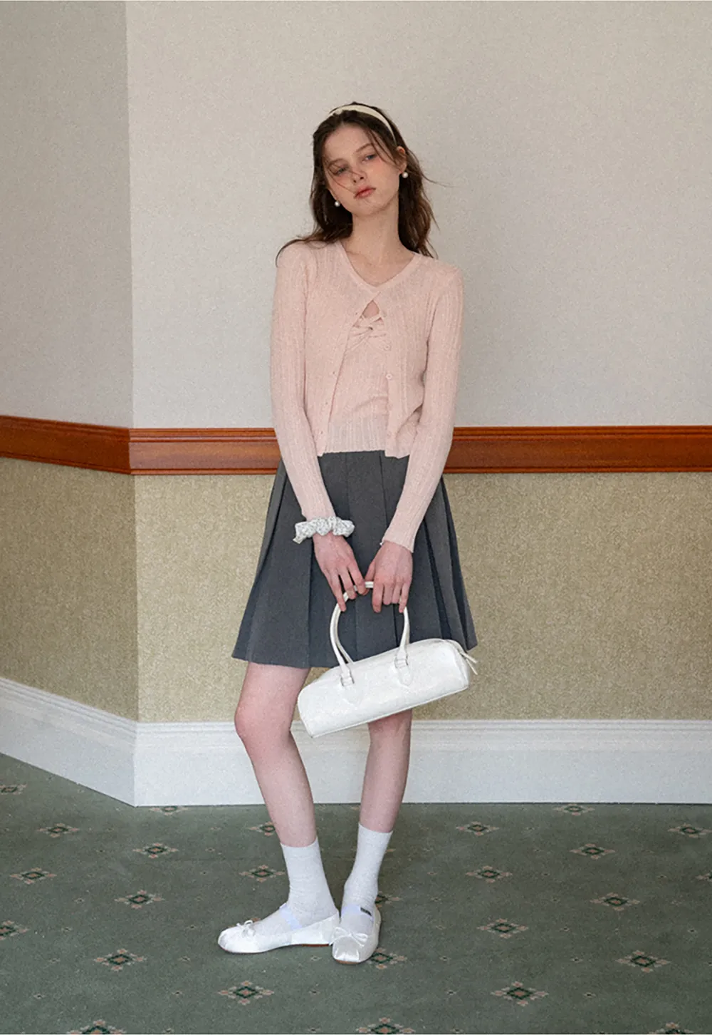 Pleated skirt with front bow detail