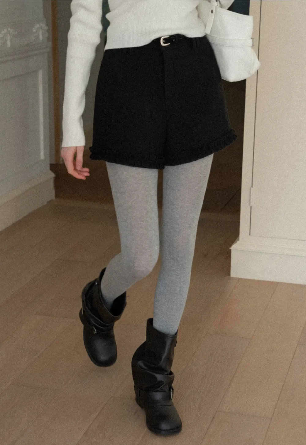 High waist shorts with ruffle hem and belt design