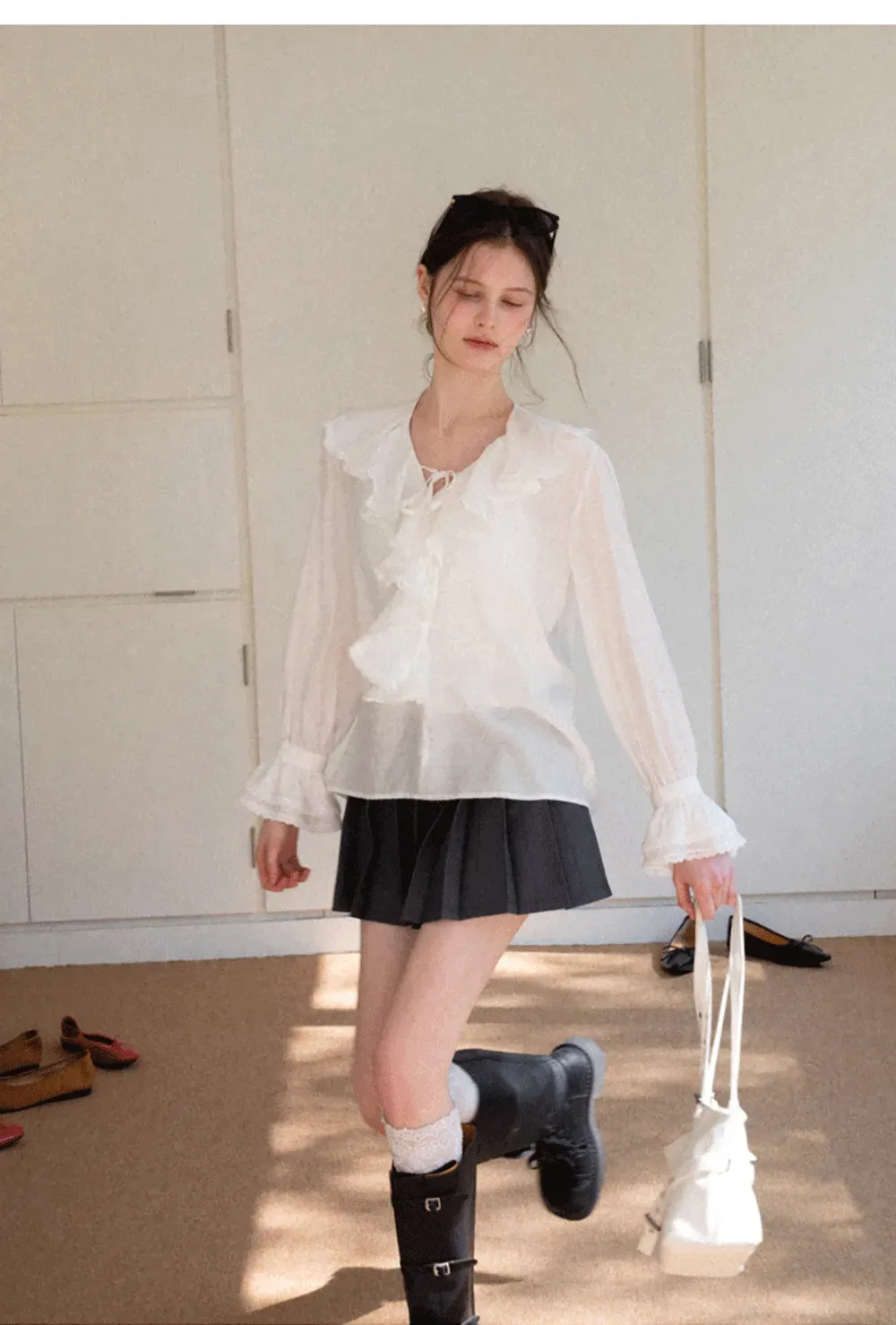 Elegant Blouse with Ruffled Neckline and Flared Sleeves