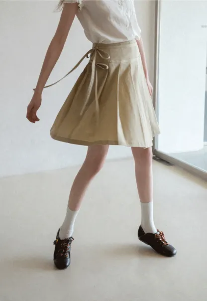 Pleated skirt with side tie waistband