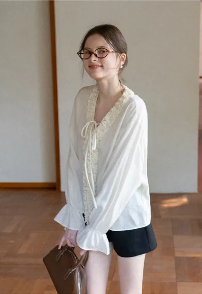 High waist pleated shorts with flared hem