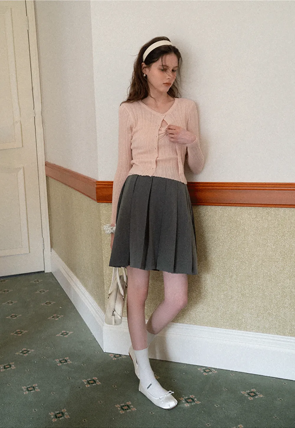 Ribbed knit sweater with V neckline and long sleeves