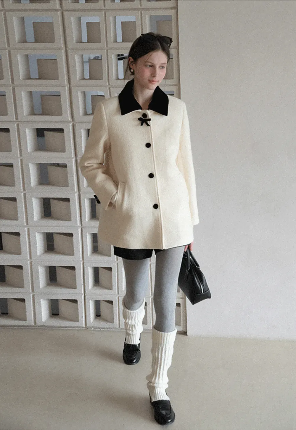 Elegant Wool Coat with Bow Detail and Contrasting Collar