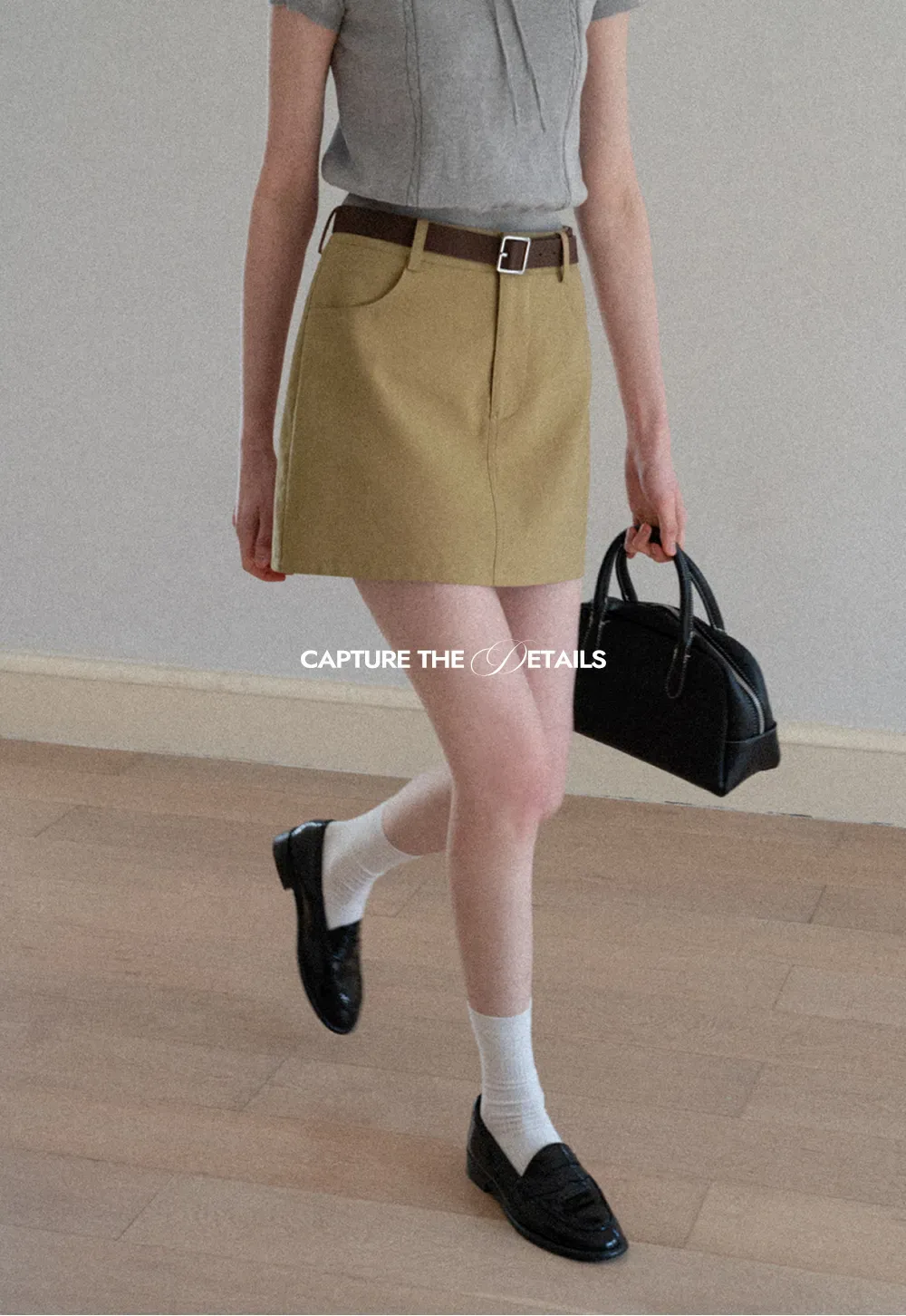 A-line mini skirt with front pockets and belt loops
