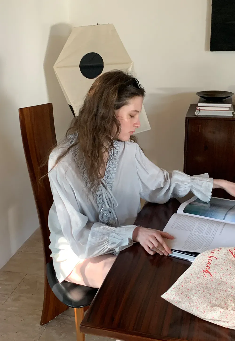 Long sleeve shirt with ruffled neckline and gathered cuffs