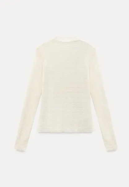 Elegant textured long sleeve top with subtle pattern design