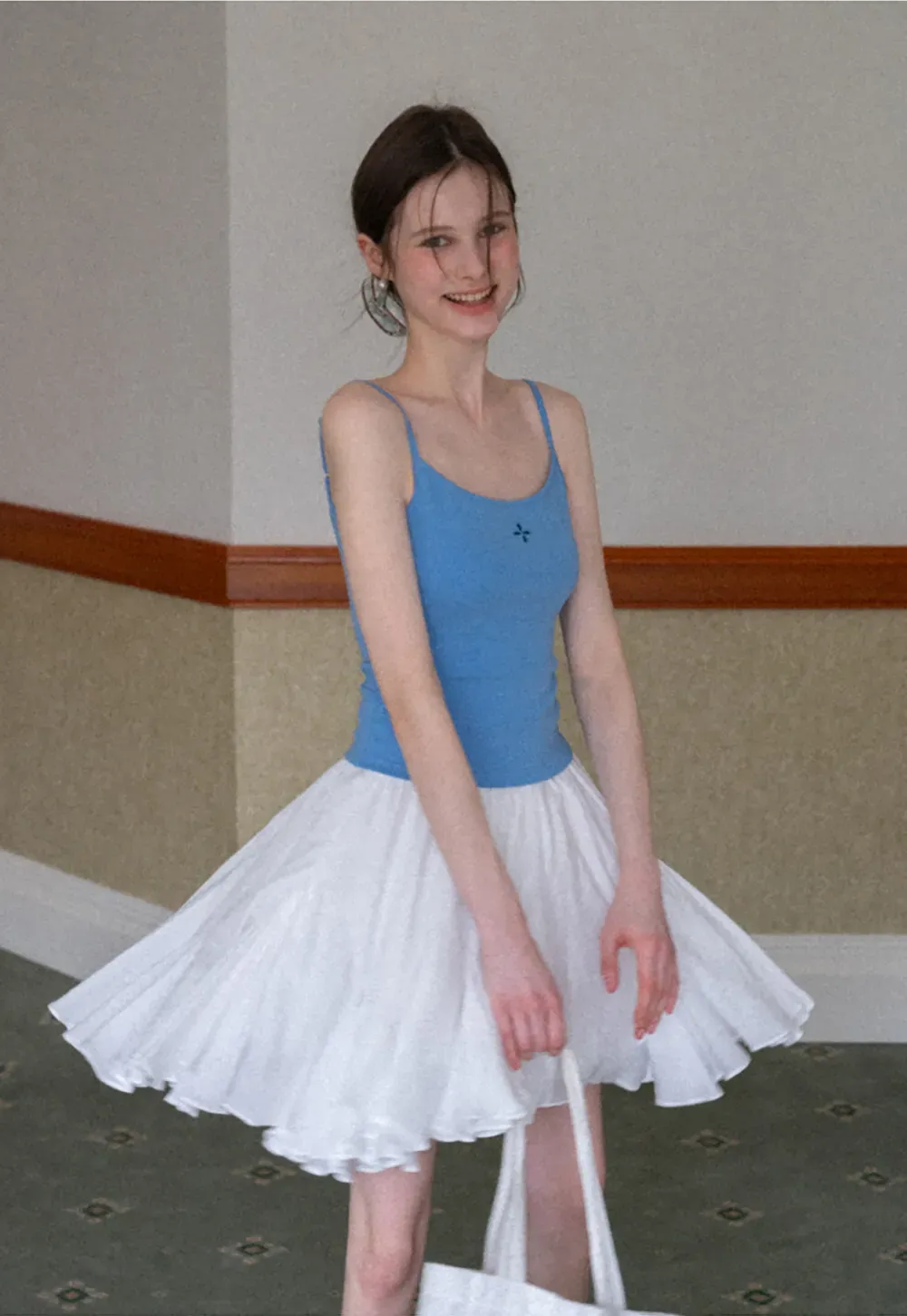 Gray tank top with small embroidered cross detail