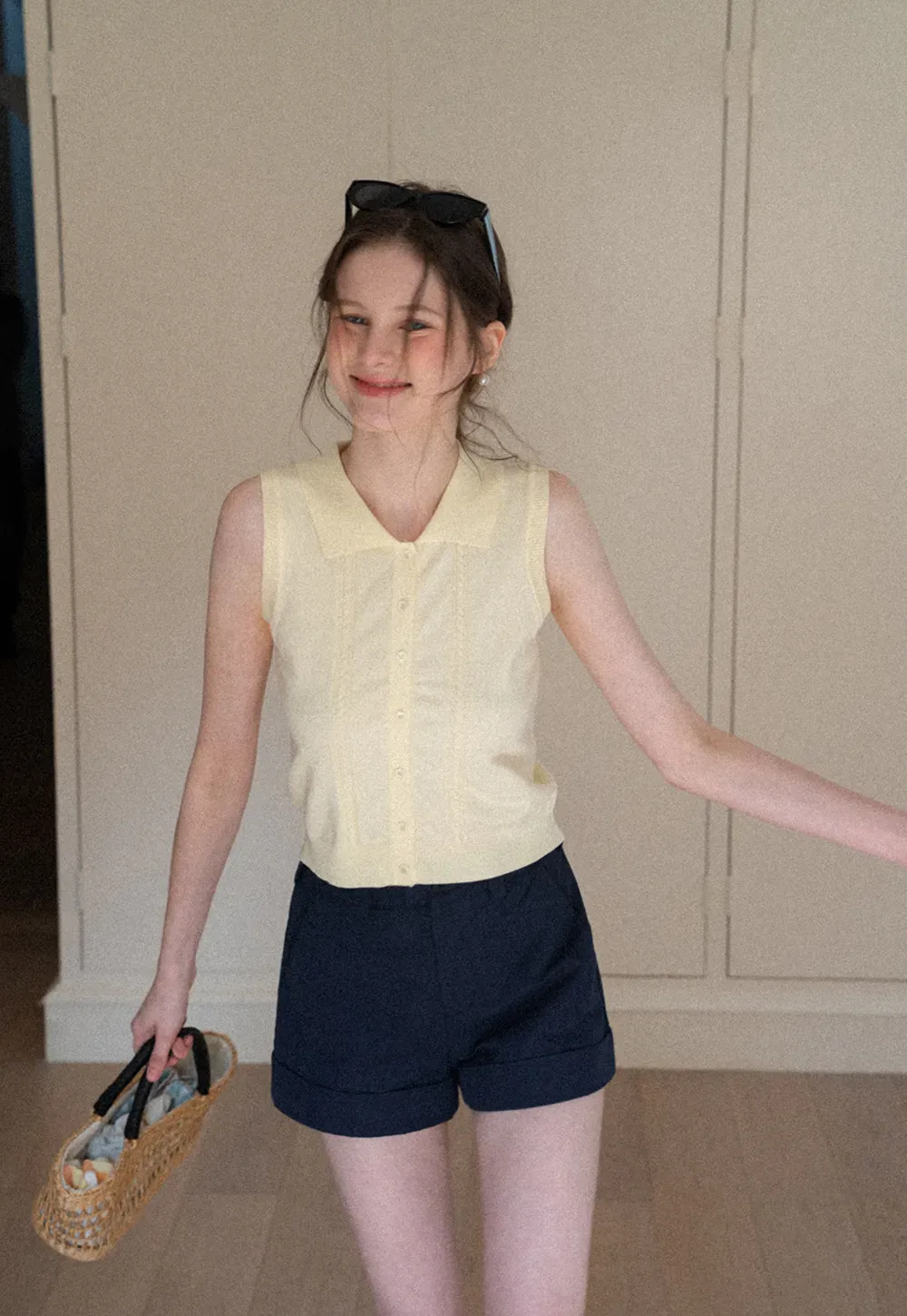 Sleeveless Knit Top with Collar and Buttons