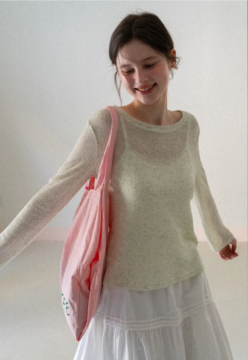 Long sleeve sheer knit top with round neckline