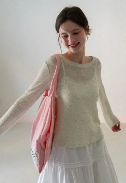 Long sleeve sheer knit top with round neckline