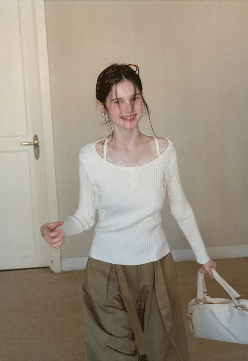 Ribbed knit sweater with boat neck and long sleeves