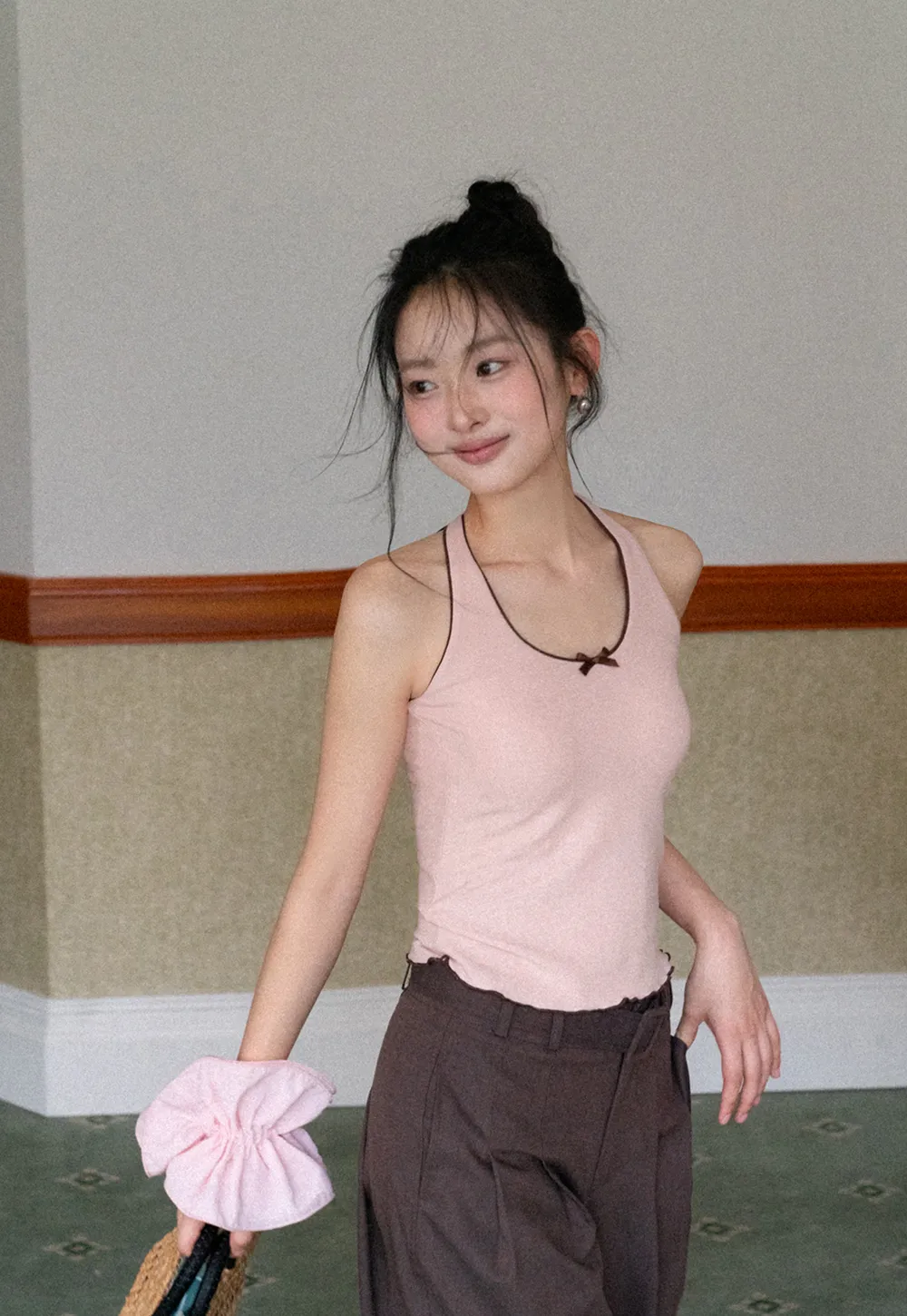 Halter neck tank top with thin straps and bow detail