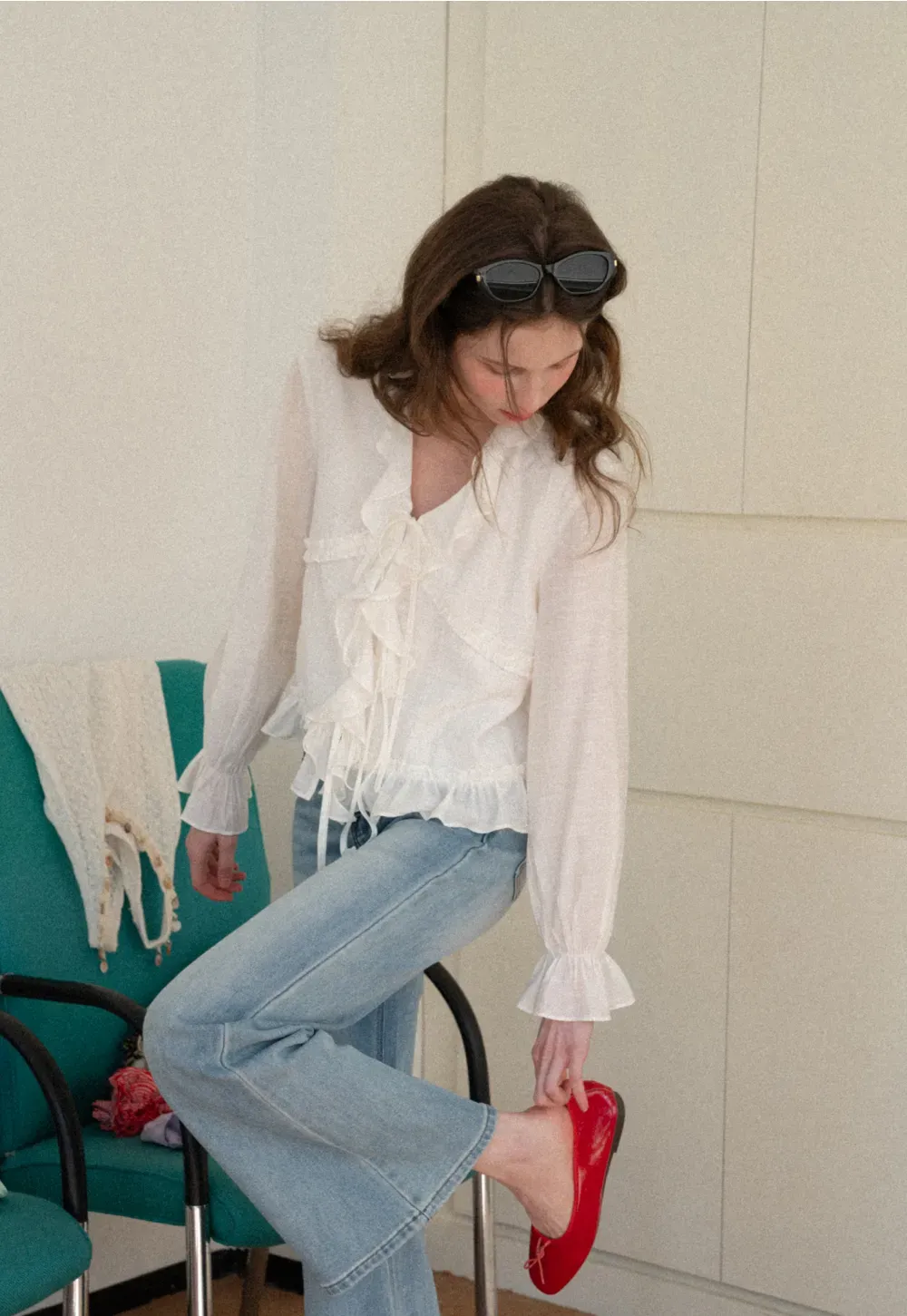 Elegant Blouse with Ruffle Detail and Tie Front Design