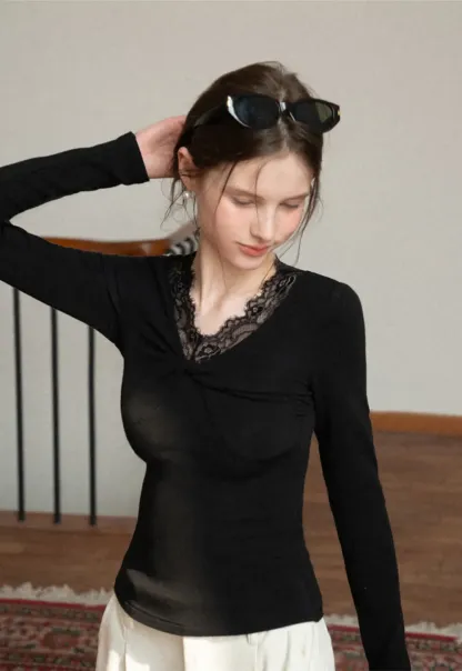 Elegant Black Lace-Trimmed Long Sleeve Top