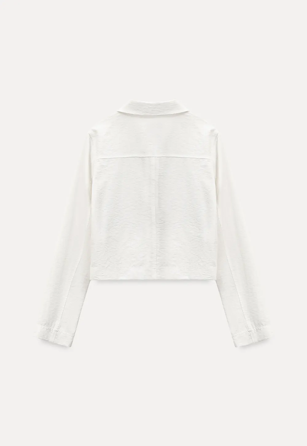 Short jacket with ruffled front placket and collar