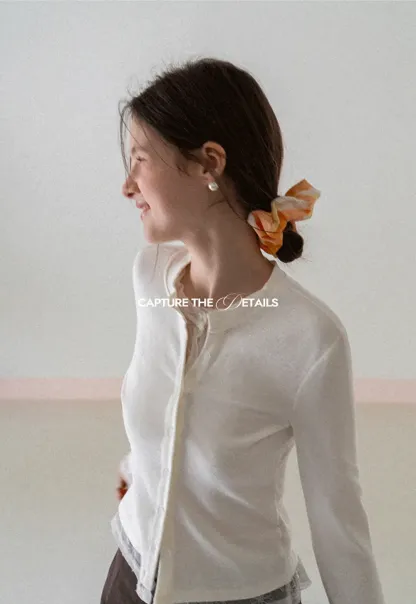 Long sleeve button front knit top with collar