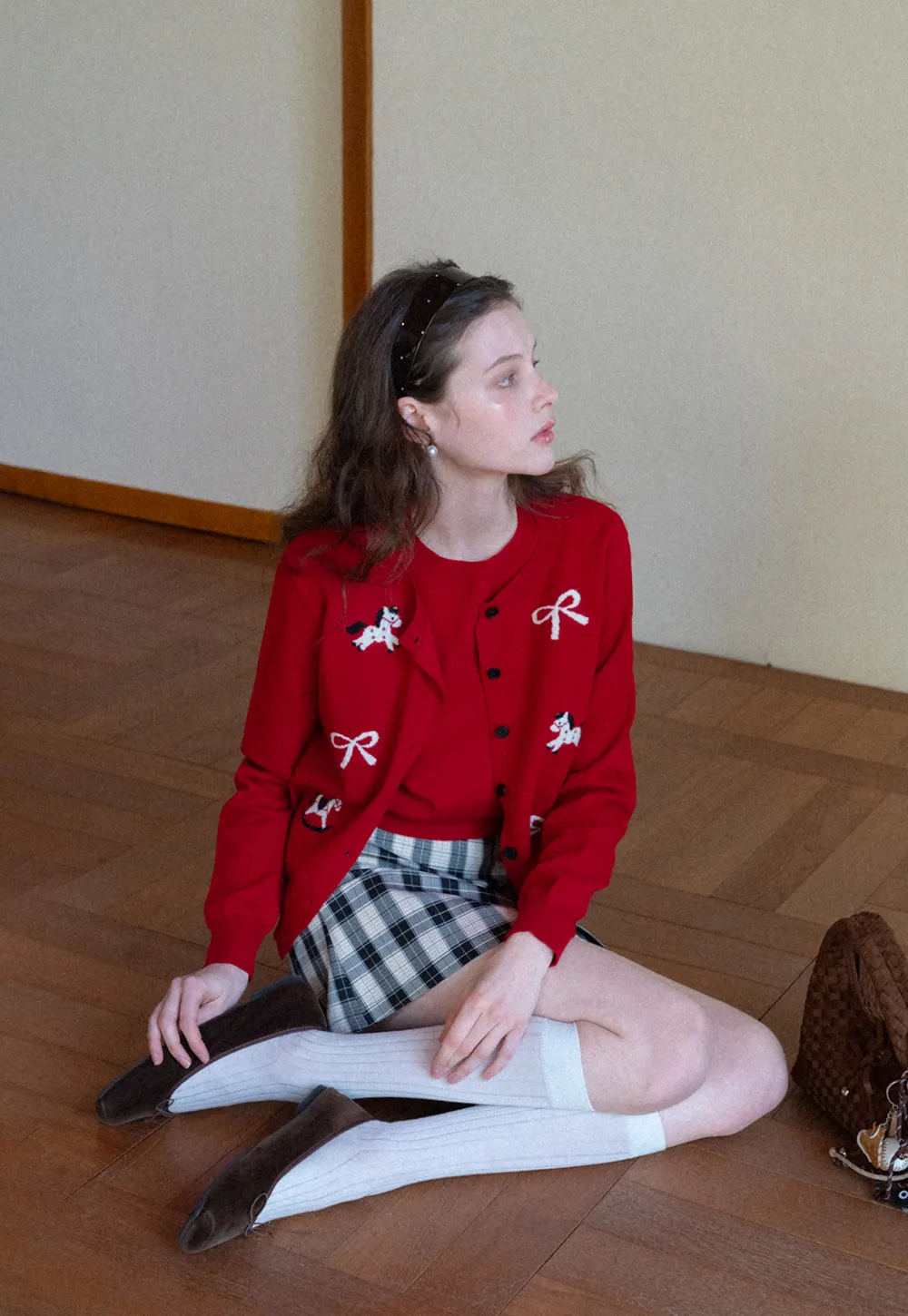 Woolen knit sweater with horse and bow motifs