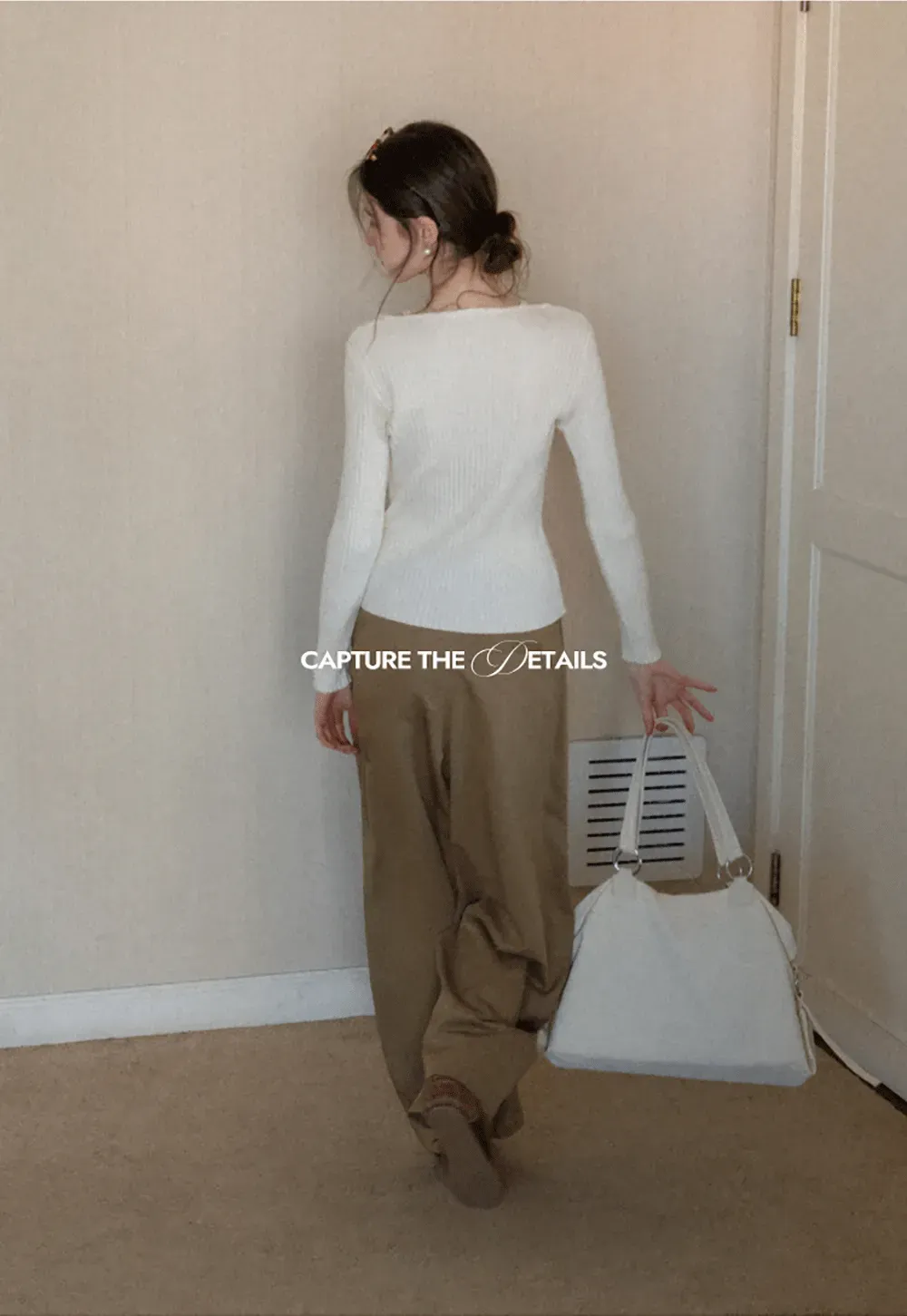 Ribbed knit sweater with boat neck and long sleeves