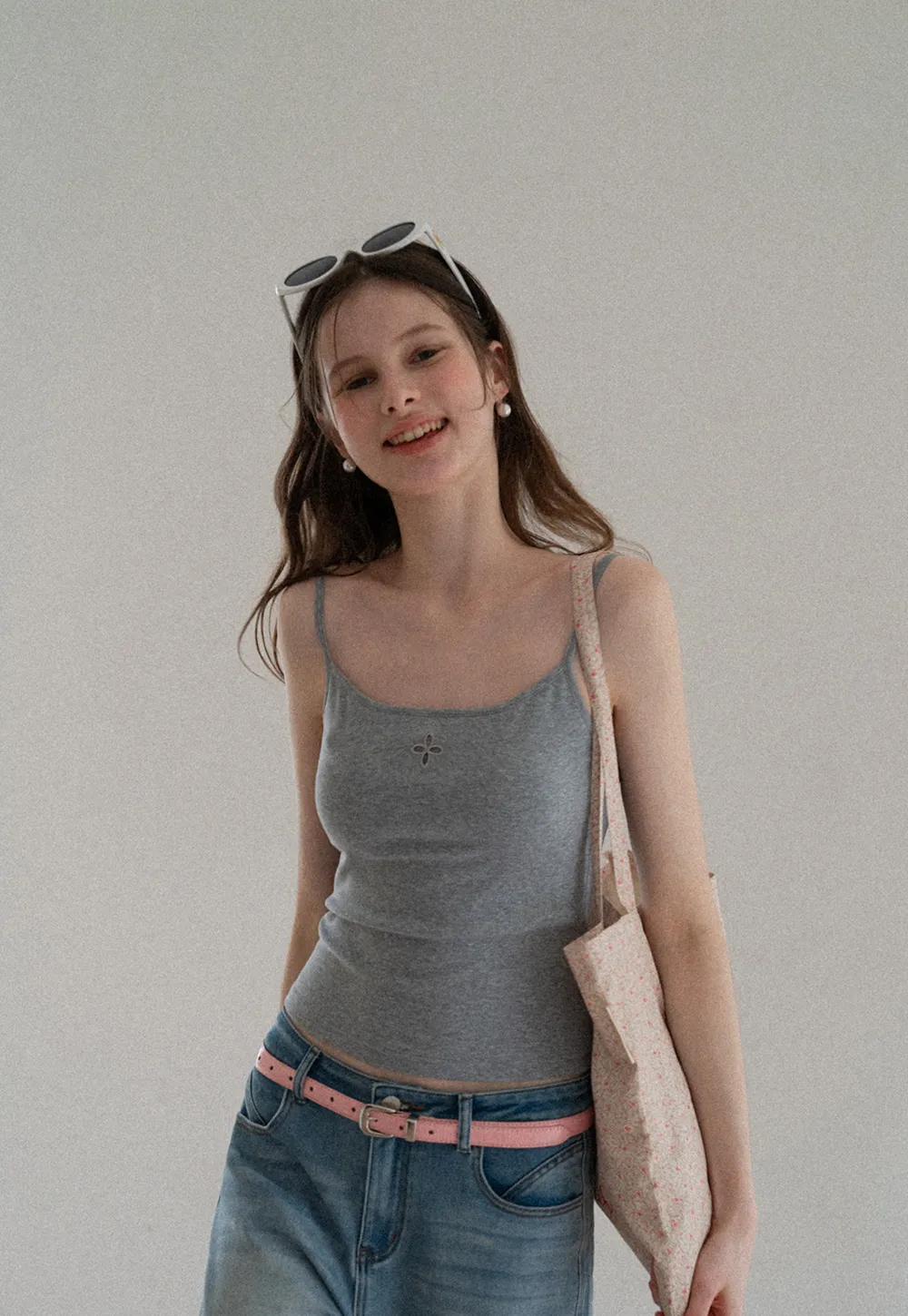 Gray tank top with small embroidered cross detail