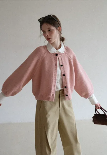 Soft knit cardigan with button front and relaxed fit