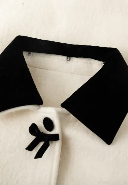 Elegant Wool Coat with Bow Detail and Contrasting Collar