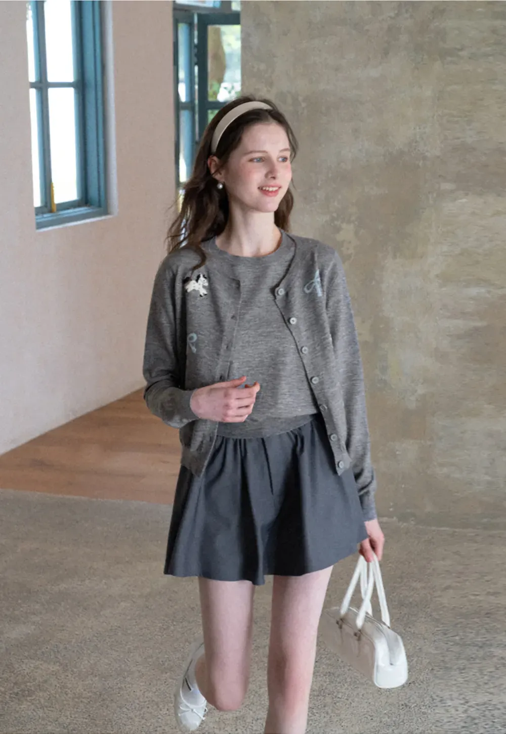 Woolen knit sweater with horse and bow motifs