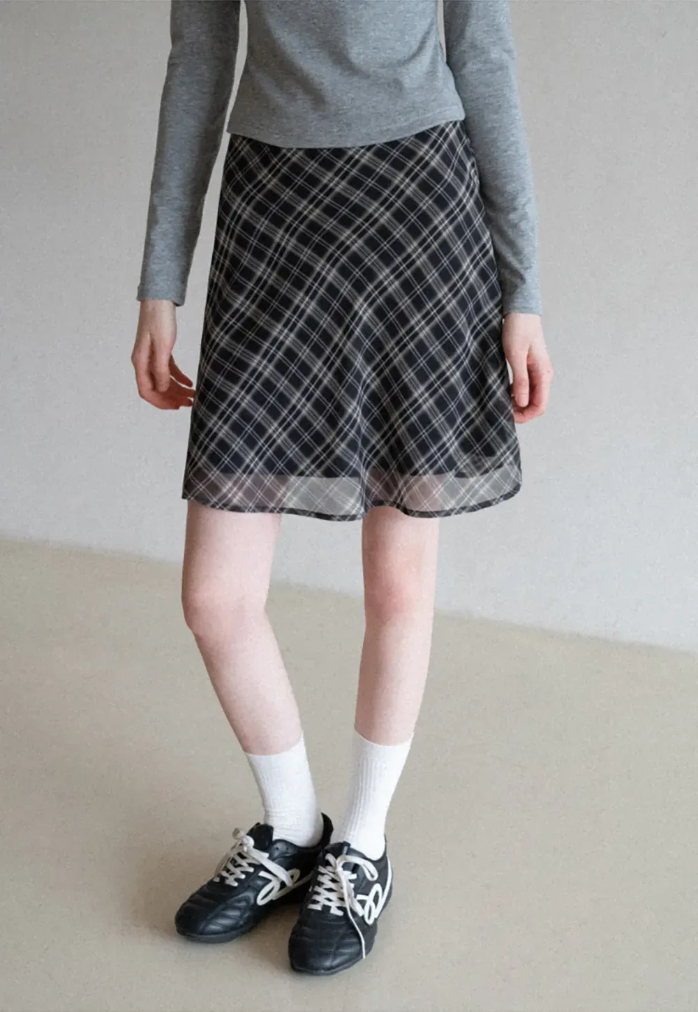 Plaid Skirt with Flowy Hem Design