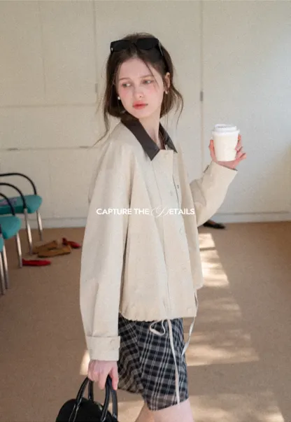 Short jacket with contrast collar and front buttons