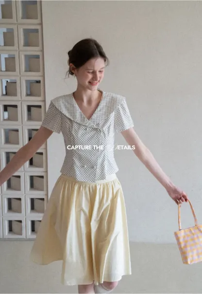 A-line pleated midi skirt with waistband