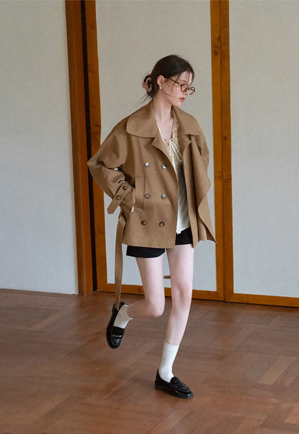 Long sleeve shirt with ruffled neckline and gathered cuffs