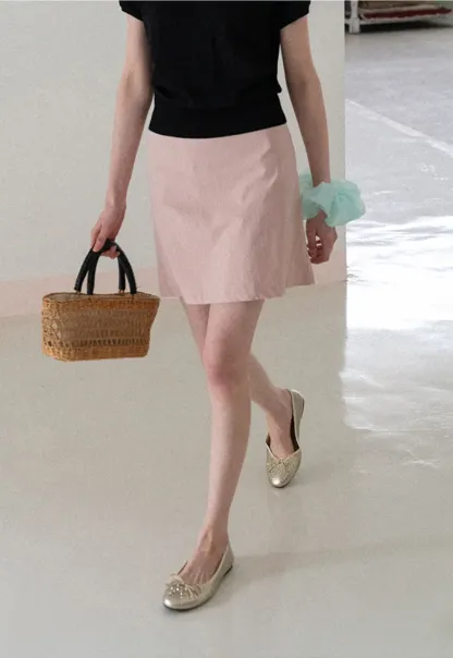 A-line mini skirt with front darts and clean hem