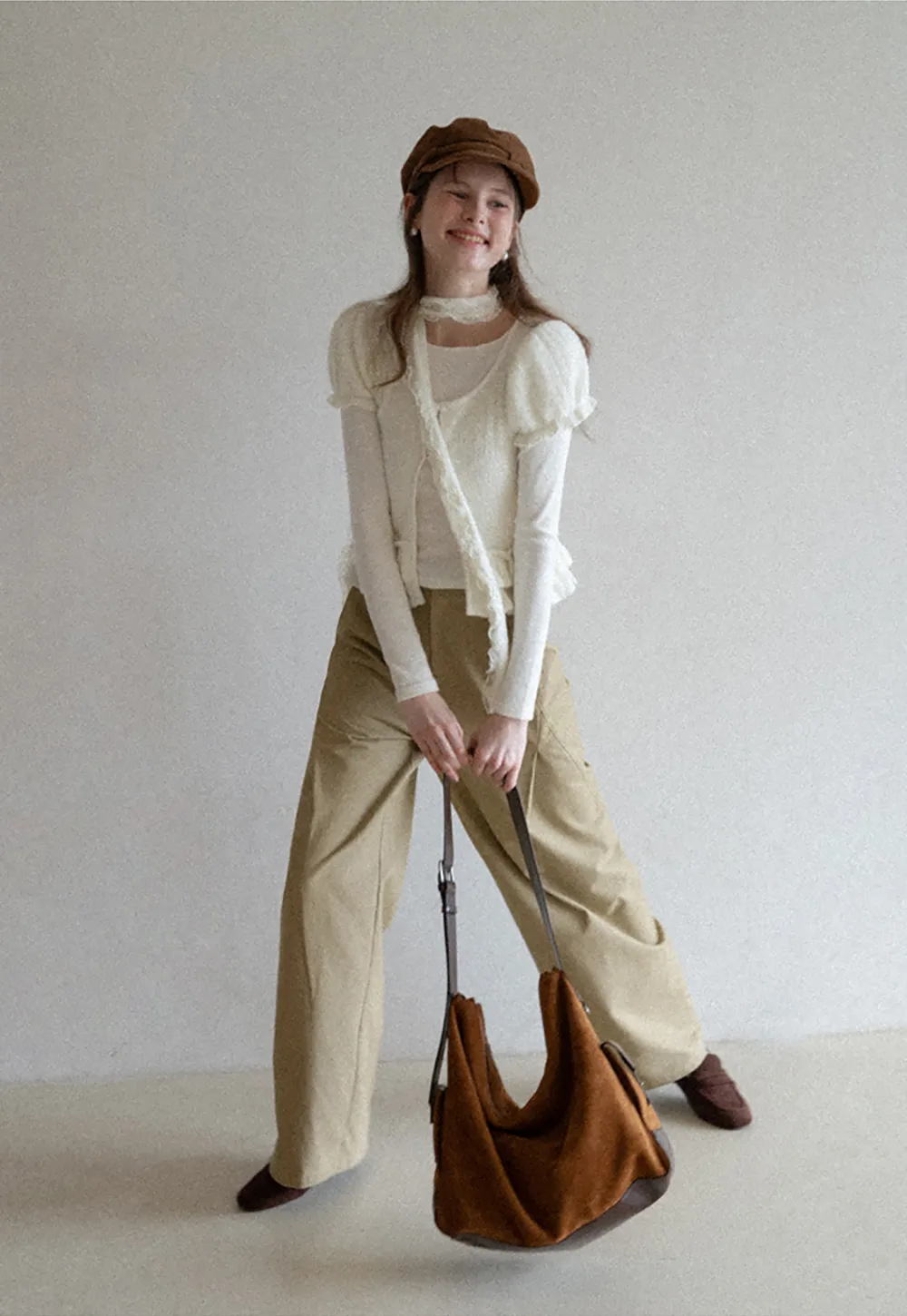 floral lace top with puffed sleeves and ruffled hem