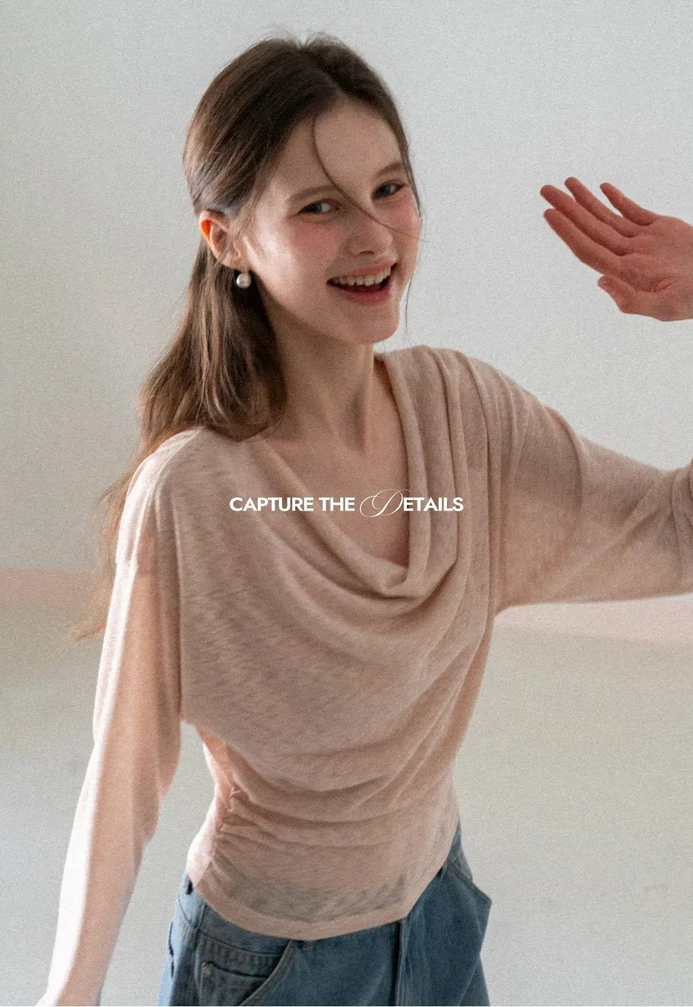 Long sleeve off shoulder draped knit top