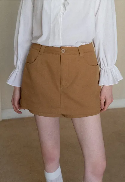 High waist pleated mini skirt with button front design